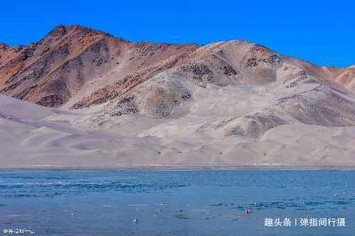 新疆有座神秘的山，山体沙子雪白如粉，日本人为何想高价购买？